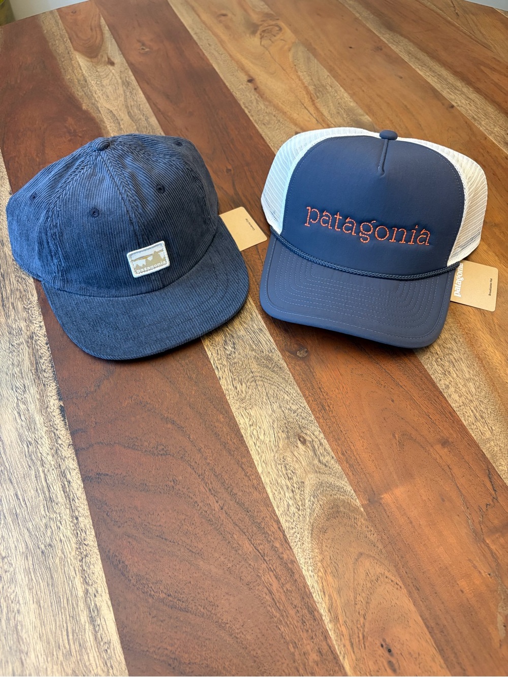 Patagonia Blue Corduroy Cap and Navy Trucker Hat with White Mesh